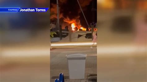 Boat engulfed in flames at a Coconut Grove marina